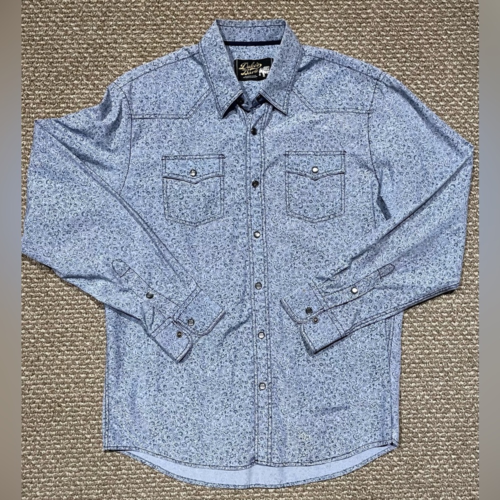 Western style long sleeve shirt with unique black pearl snaps